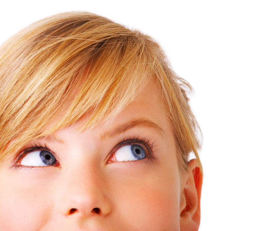 Young woman looking up